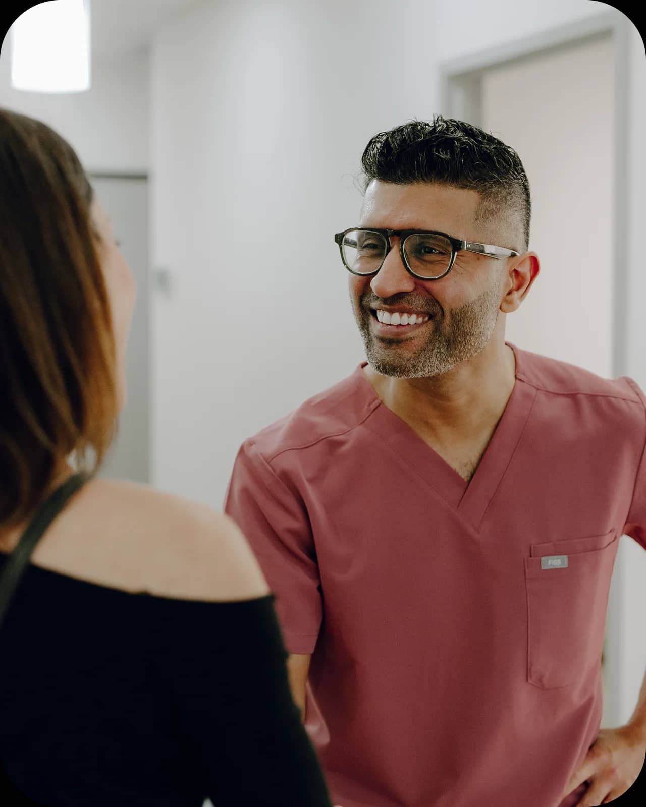 Dentist discussing dental care options with a patient